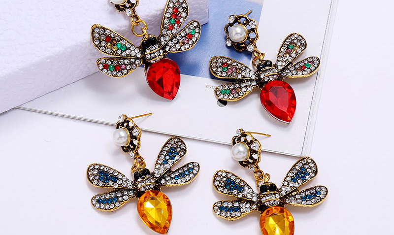 Fashion Yellow Diamond Pearl Insect Flower Alloy Hollow Earrings,Stud Earrings