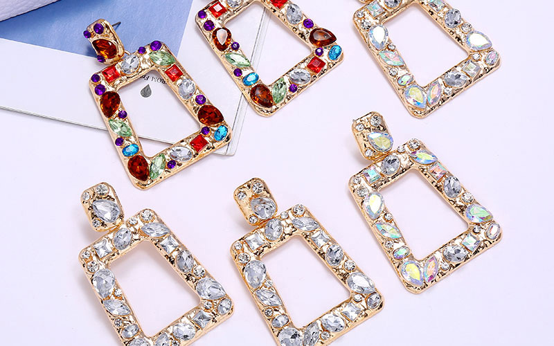 Fashion White Diamond Diamond-shaped Geometric Hollow Alloy Earrings,Stud Earrings