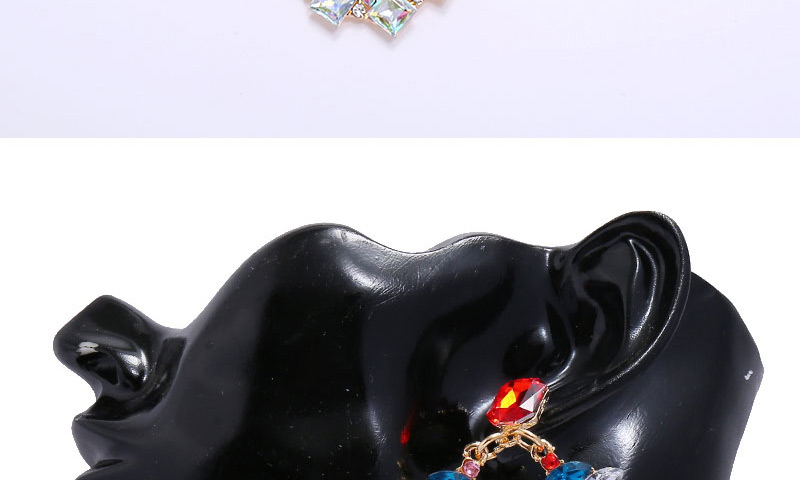 Fashion White Diamond Diamond-shaped Geometric Hollow Alloy Earrings,Stud Earrings