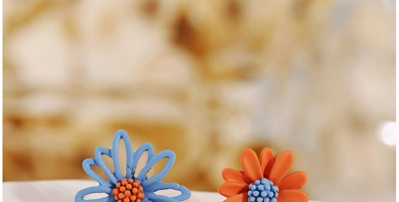 Fashion Blue Tangerine Asymmetrical Daisy Hollow Alloy Earrings,Stud Earrings