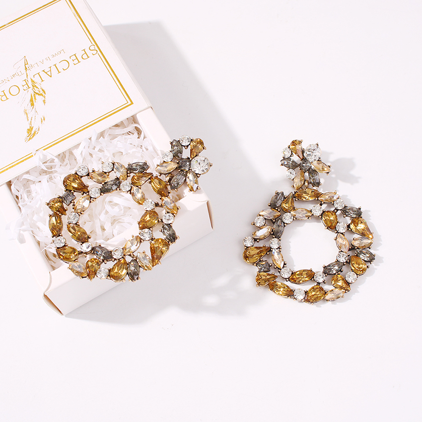 Fashion Yellow Diamond-shaped Alloy Flower Geometric Hollow Earrings,Drop Earrings