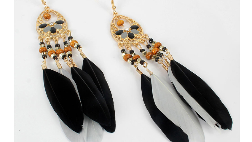 Fashion Black Geometric Alloy Drop-shaped Feather Hollow Earrings,Drop Earrings