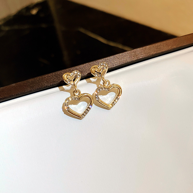 Fashion Gold Alloy Hollow Heart Stud Earrings,Stud Earrings