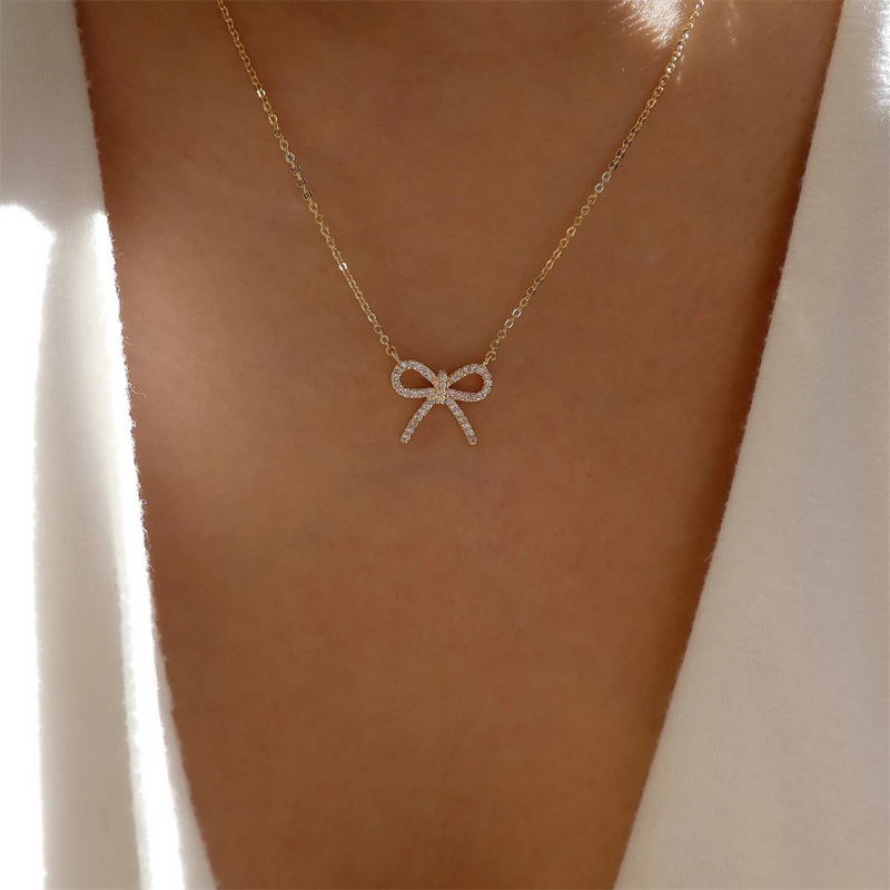 Fashion Gold Alloy Diamond Bow Necklace,Pendants