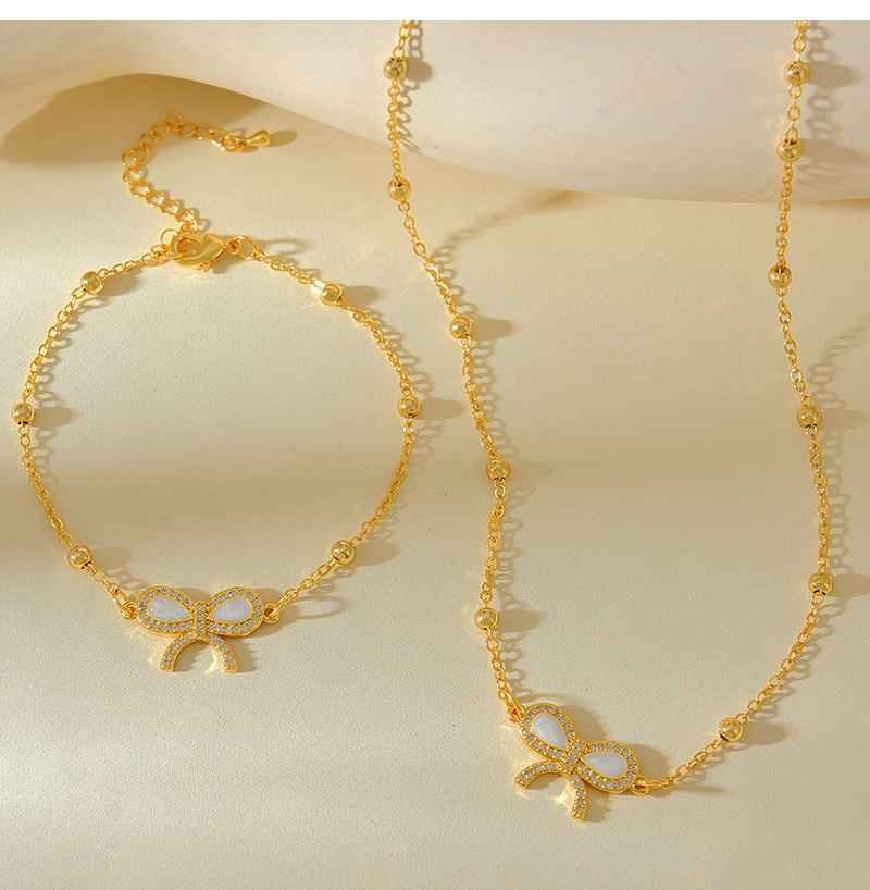 Fashion Golden 2 Copper Inlaid Zircon Shell Bow Pendant Bead Bracelet,Bracelets