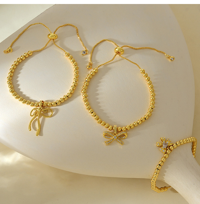 Fashion Golden 3 Copper Set Zircon Bow Pendant Beaded Bracelet,Bracelets