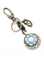 Fashion Bronze Alloy Hollow Five-pointed Star Symbol Doll Flower Glass Keychain