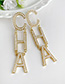 Fashion Gold Alloy Pearl Letter Stud Earrings