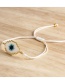 Fashion Yellow Rice Beads Woven Eye Tassel Bracelet