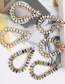 Fashion White Drop-shaped Alloy Cutout Earrings With Diamonds