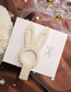 Fashion White Hand Woven String Pearl Bow Hollow Hair Clip