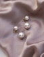 Fashion White Pearl Back Hanging Round Alloy Earrings