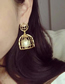 Fashion Gold Alloy Hollow Birdcage Hanging Bead Earrings