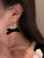 Fashion Gold Alloy Oval Velvet Bow Earrings