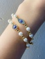 Fashion Blue Copper Inlaid Zirconium Pearl Beaded Eye Bracelet