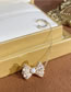 Fashion Main Picture Alloy Pearl Bow Earrings