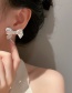 Fashion White Pearl Bow Stud Earrings