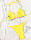Fashion Yellow Lace-up Stitching Split Swimsuit