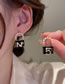 Fashion Black Alloy Diamond Alphanumeric Tote Stud Earrings