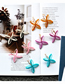 Fashion White Windmill Acrylic Cutout Pinwheel Earrings