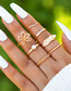 Fashion Gold Alloy Set Pearl Flower Twist Ring Set