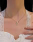 Fashion Gold Titanium Diamond And Pearl Bow Necklace