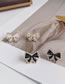 Fashion White Alloy Set Pearl Bow Stud Earrings
