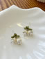 Fashion White Alloy Geometric Lily Of The Valley Stud Earrings