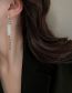 Fashion Silver Needle - White Cat's Eye Bamboo Text Tassel Earrings