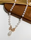 Fashion Gold Alloy Inlaid Diamond Pearl Bow Necklace