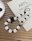 Fashion Black And White Burst Bead Beaded Heart Bow Phone Chain