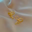 Fashion Gold Titanium Steel Bow Stud Earrings