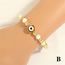 E. Geometric Gold Bead Pearl Beaded Eye Bracelet