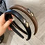 Fashion Black Three-dimensional Oval Leather Wide-brimmed Headband