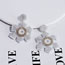Fashion White Alloy Geometric Flower Earrings