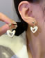 Fashion Gold Alloy Hollow Heart Earrings
