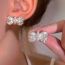 Fashion Bright Silver Alloy Pearl Pleated Bow Stud Earrings