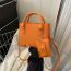 Fashion Orange Pu Head Pattern Large Capacity Crossbody Bag