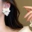 Fashion Beige Alloy Diamond Pearl Love Bow Earrings