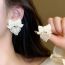 Fashion Beige Alloy Diamond Pearl Love Bow Earrings