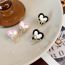 Fashion Black And White Love Heart Alloy Oil Dripping Love Bow Earrings