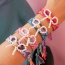 Fashion Color 7 Bow Pearl Woven Pattern Tassel Bracelet