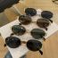 Fashion Black Frame White Film Metal Oval Sunglasses