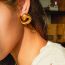 Fashion White K Spiral Pattern Horn Earrings