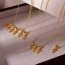 Fashion Golden 4 Copper Set With Zirconia Multiple Hearts Boy Pendant Necklace
