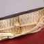 Fashion Gold Color Tassel Pendant Decorated Snakeskin Design