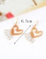 Fashion Gold Color Pearls Decorated Hollow Out Heart Shape Earrings