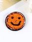Elegant Orange Smiling Face Shape Decorated Brooch